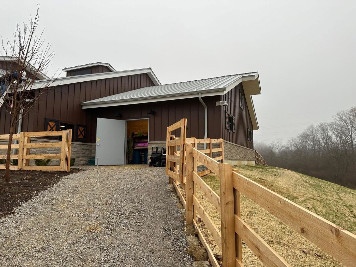 Brown Windy Hill pole barn with metal roof