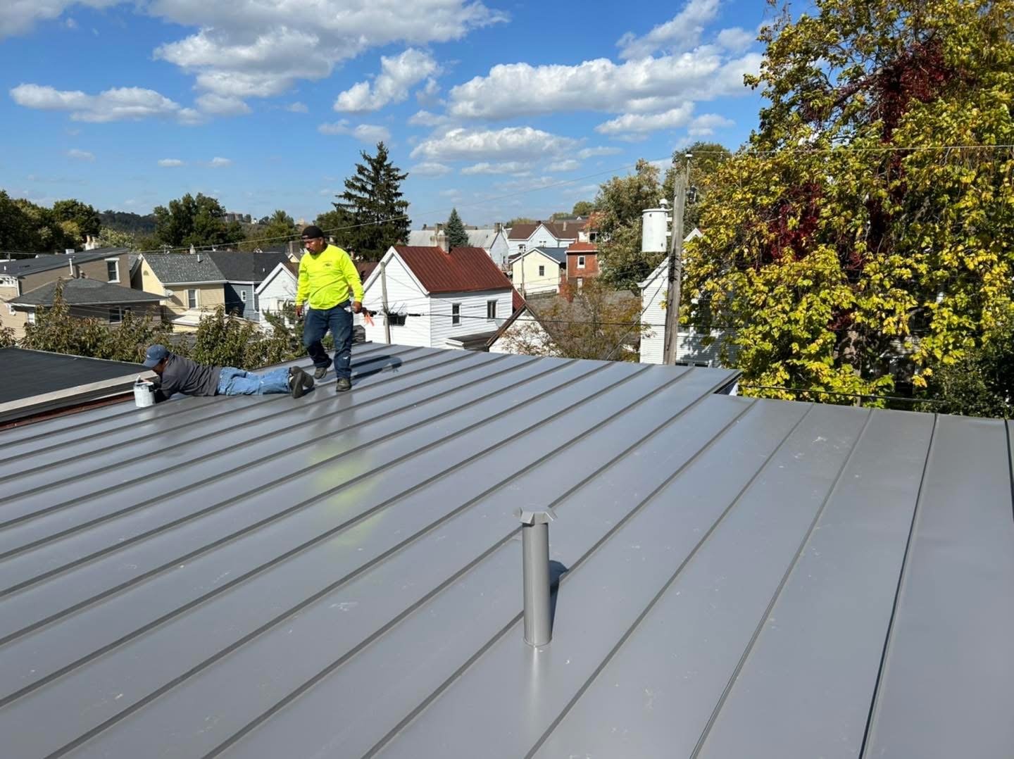 Installer on a Windy Hill standing seam metal roof on the job